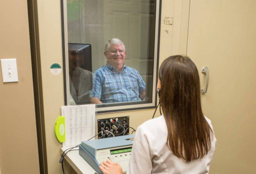 Dr. Sheehey evaluating a senior patient's progress