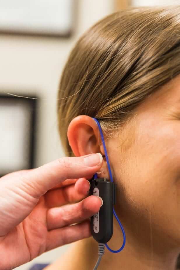 REM test being performed on a female at Alabama Hearing Associates